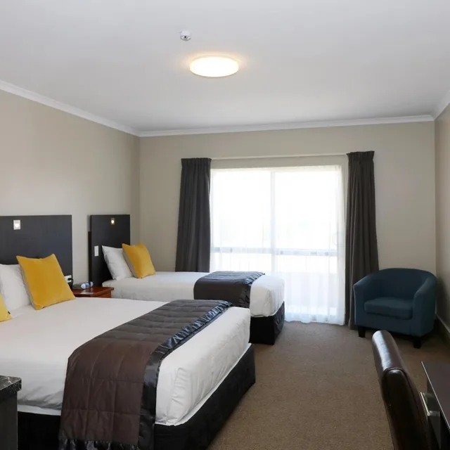 غرفة ديلوكس بسرير كوين، The Victoria Hotel Dunedin 1/4