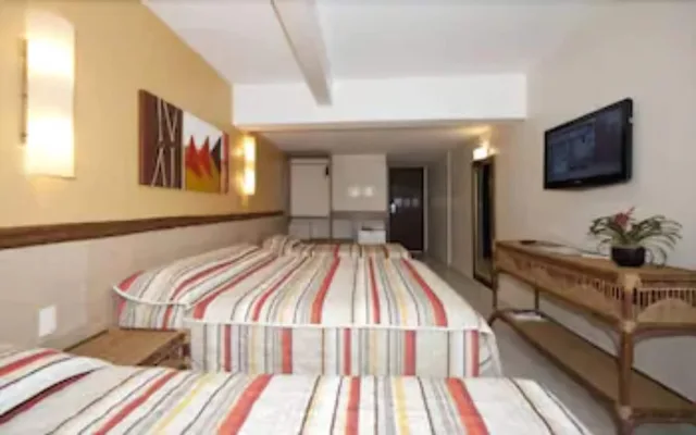 غرفة رباعية بسرير مزدوج وسريرين منفصلين بإطلالة على البحر، Varandas do Atoll Hotel 3/6