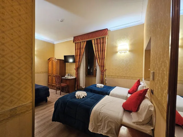غرفة ديلوكس رباعية بسرير مزدوج وسريرين منفصلين، AMADEUS HOTEL ROME 4/5