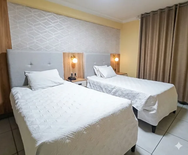 غرفة أساسية بسريرين منفصلين، Hotel Plaza by DOT Light 1/9