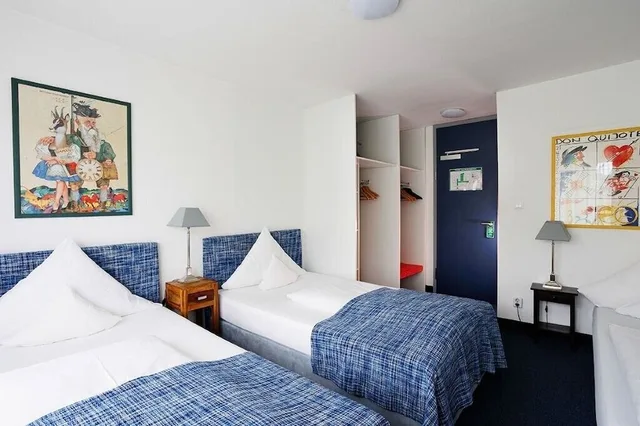 غرفة ثلاثية بسريرين منفصلين بإطلالة على المدينة مع أريكة، Hotel Nymphenburg City 8/10