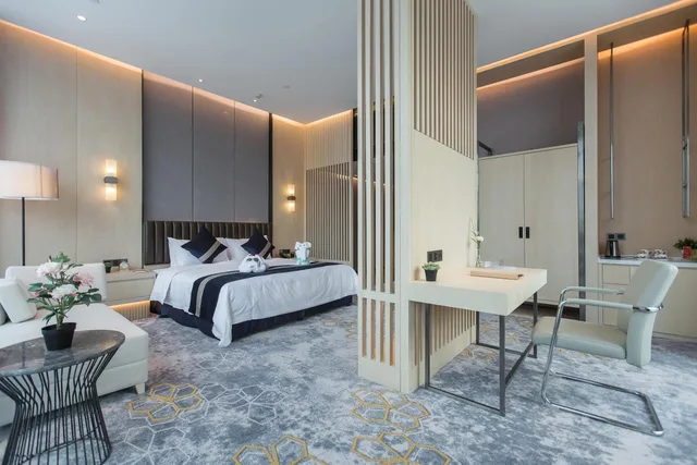 غرفة تنفيذية بسرير كينج، Grand Metropark Hotel Liyuan Chongqing 7/10