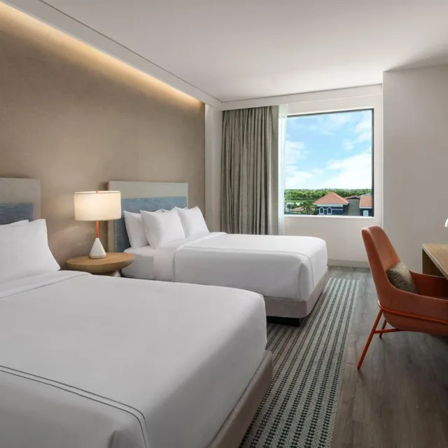 غرفة قياسية بسريرين كوين بحوض استحمام لذوي الإعاقة، Even Hotel Orlando Universal Blvd By Ihg 4/9