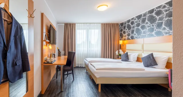 غرفة قياسية بسرير مزدوج، PLAZA INN Stuttgart-Filderstadt 1/7
