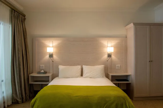 غرفة عائلية بسرير كوين وسريرين منفصلين، Val Du Charron Coach House 2/10