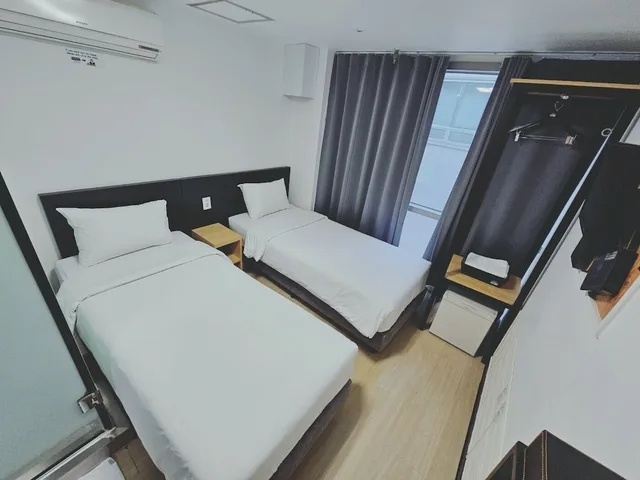 غرفة بسريرين منفصلين، Ekonomy Hotel Myeongdong Premier 3/10