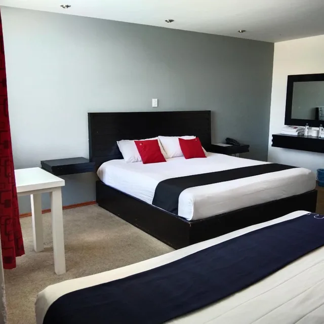 غرفة ديلوكس بسريرين، Capital O Hotel Euro Confort Pachuca 1/9
