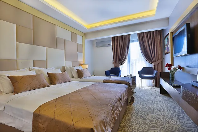 غرفة رباعية بسرير مزدوج وسريرين منفصلين، Grand Sagcanlar Hotel 1/9