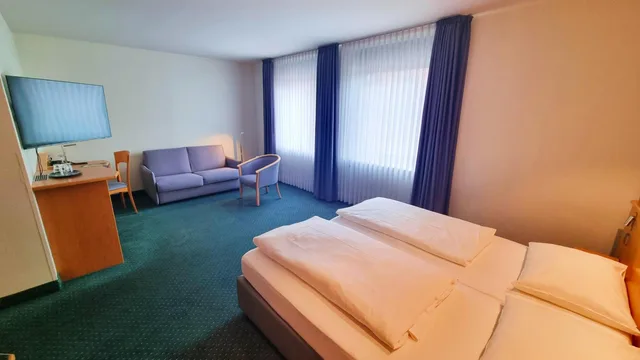 غرفة بسرير كينج مع سرير إضافي، Hotel Panorama Hamburg-Harburg 7/10