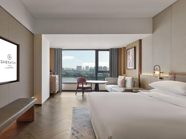 غرفة ديلوكس بسرير كينج بإطلالة على البحيرة، S&amp;N International Hotel Jiujiang 1/3