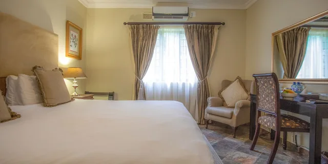 غرفة ديلوكس بسرير كينج، At Heritage House 1/4