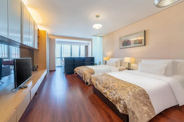 Room, Twin Beds, City View, Qingdao Housing International Hotel 1/2