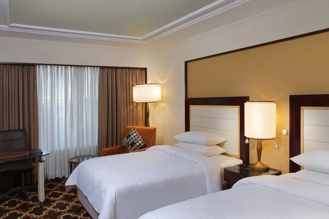 غرفة بسريرين منفصلين، Sheraton Grand Pune Bund Garden Hotel 1/1