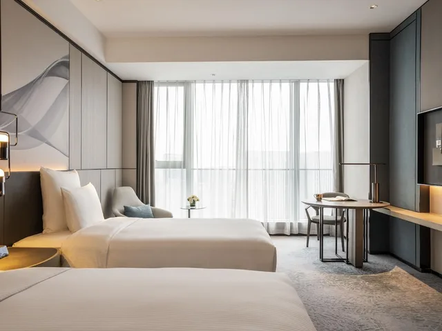 غرفة ديلوكس بسريرين منفصلين في طابق مرتفع، Pullman Jiaxing Pinghu Excellence 1/5