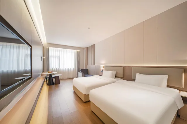 غرفة سوبيريور بسريرين منفصلين، Poltton International Service Apartment- Liuzhou Wanda Plaza 1/2