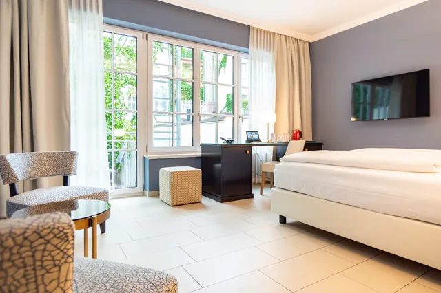 جناح بسرير كينج وسريرين منفصلين بإطلالة على الحديقة بشرفة، Hotel Spiess Spiess Appartement Pension 3/7