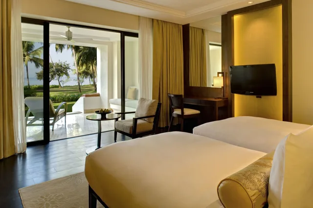 غرفة بسريرين منفصلين بإطلالة على الحديقة بشرفة، GRAND HYATT GOA 10/10