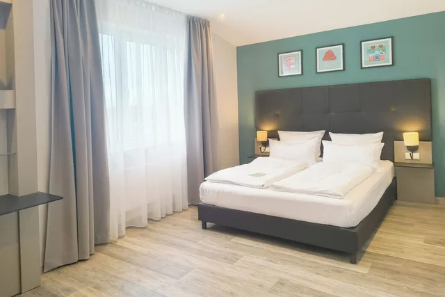 غرفة بريميوم بسريرين كوين مع أريكة، Select Hotel A1 Bremen 3/7