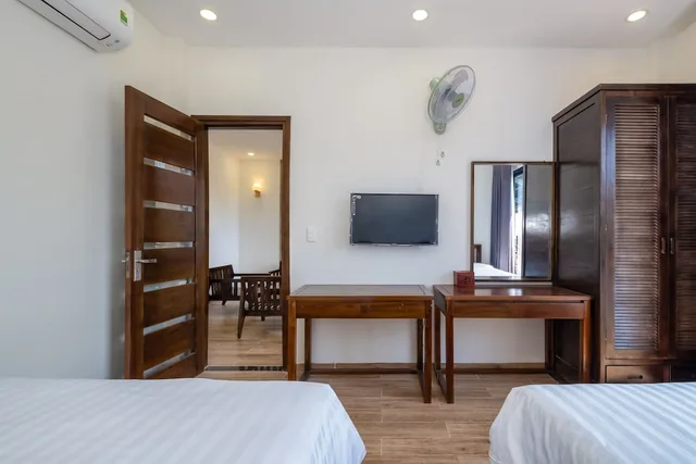 جناح عائلي بسرير كوين وسريرين مزدوجين، Melica Resort & Spa Phu Quoc 4/6