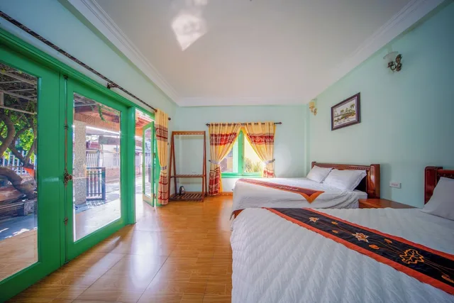غرفة عائلية بسرير كوين وسرير فردي بشرفة، Tam Coc Tuan Minh Homestay 3/10