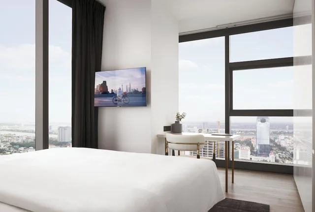 غرفة بريميير بسرير كينج وسرير كوين وسريرين منفصلين بـ3 غرف نوم، Citadines Flatiron Phnom Penh 5/8