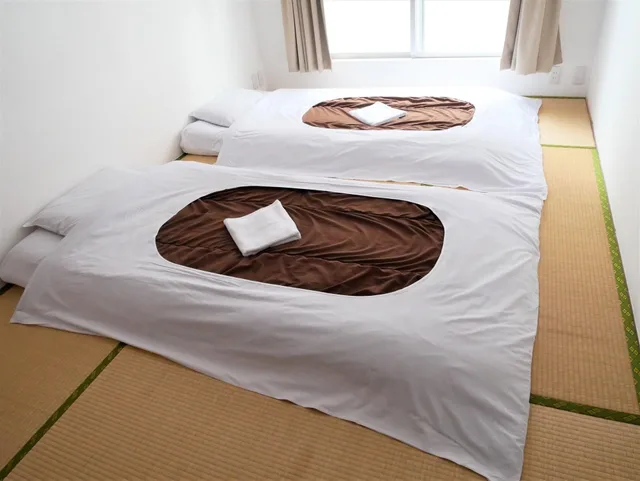 غرفة يابانية بسريرين منفصلين بحمام مشترك، Sakura Hotel Nippori 1/2