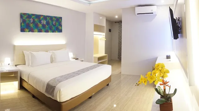 غرفة ديلوكس بسرير كينج بإطلالة على الحديقة، Grand Harvest Resort and Villas 9/10