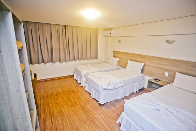 غرفة تنفيذية رباعية بسرير كوين وسريرين منفصلين، Dalle Hotel 1/2