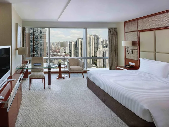 غرفة ديلوكس بسرير كينج، Pullman Shanghai Central 3/6
