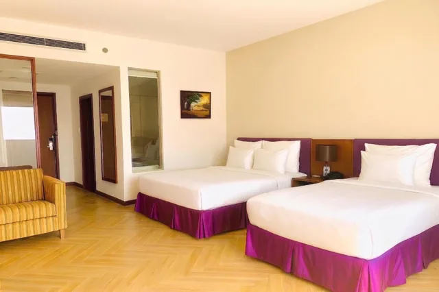 غرفة ثلاثية بسرير كوين وسرير فردي بإطلالة على المدينة، TTC Hotel - Michelia 2/7