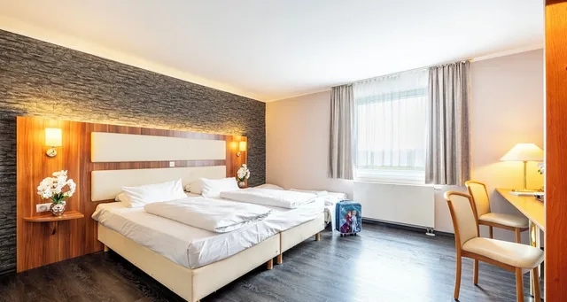 غرفة كومفورت ثلاثية بسرير مزدوج، Plaza Hotel Zwickau 3/7
