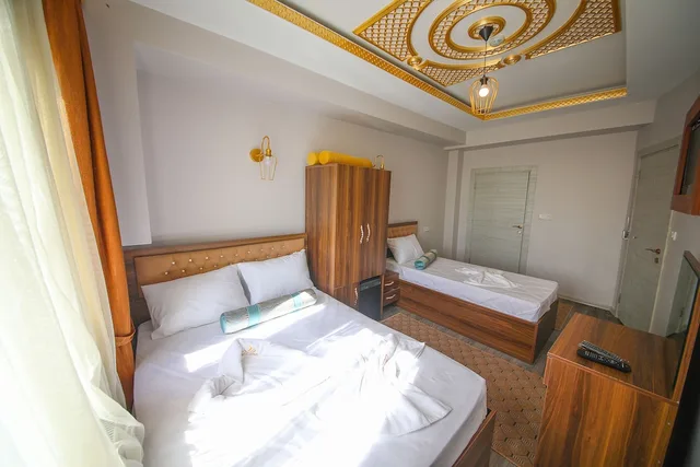 غرفة عائلية ثلاثية بسرير كوين وسرير فردي بإطلالة على البحر، Delbab Hotel 1/5