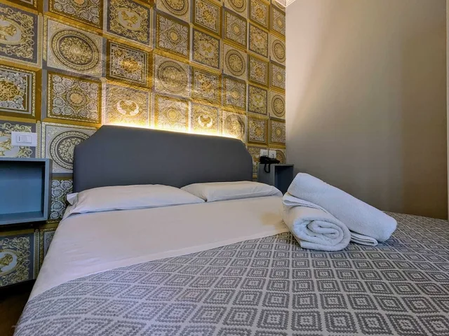 غرفة ثلاثية بسرير مزدوج وسرير فردي، Hotel Soggiorno Athena 5/10