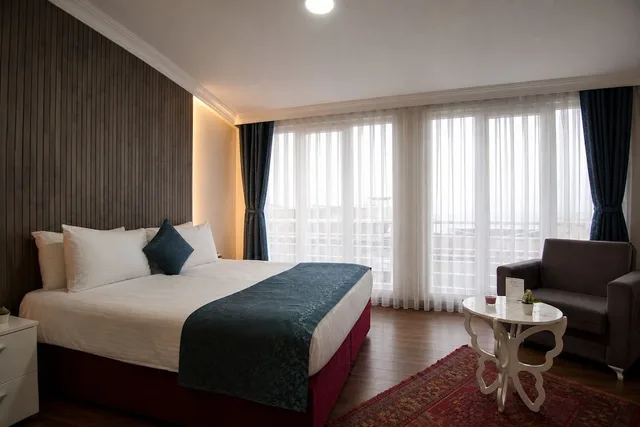 غرفة ديلوكس بسرير كوين وسرير فردي، Nar Sultan Hotel 7/10