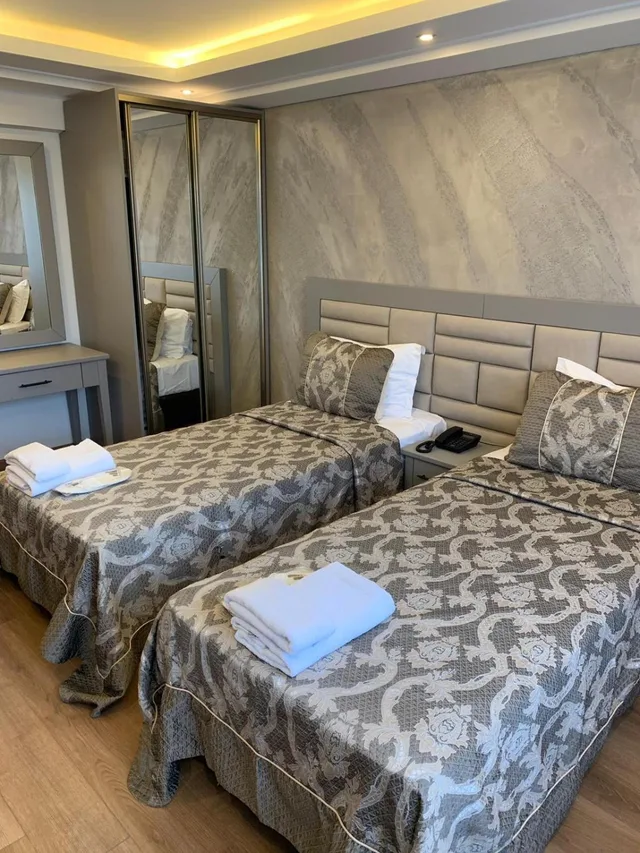 غرفة قياسية بسرير مزدوج أو سريرين منفصلين، Regency World Suite 5/7
