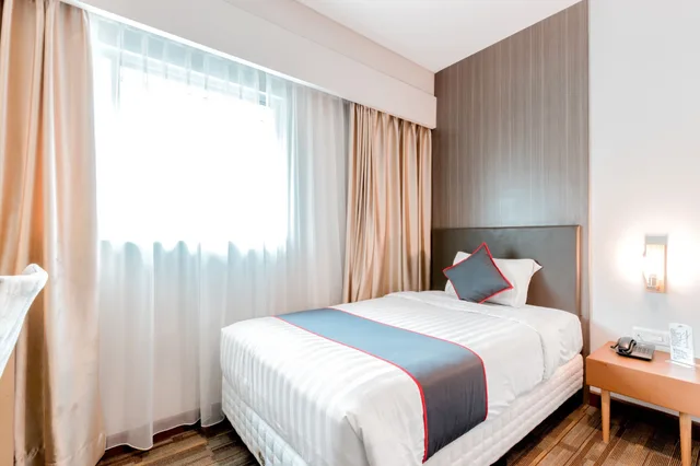 غرفة قياسية بسريرين منفصلين، Collection O 7 Hotel Melawai 1/4