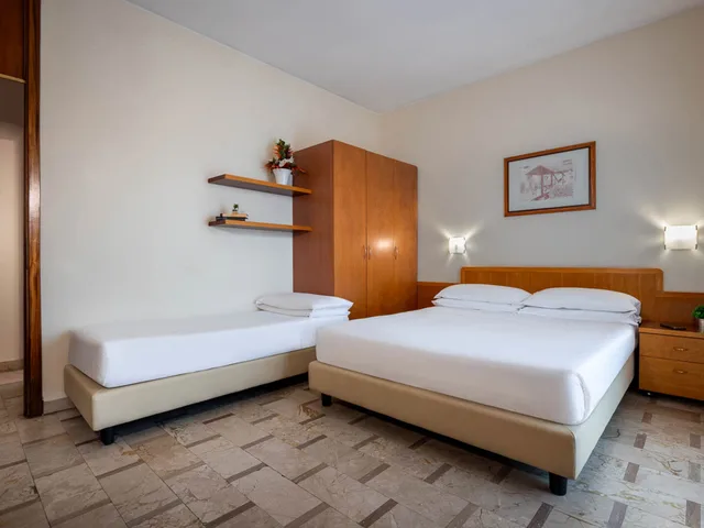غرفة بسرير كوين بمطبخ صغير، iH ApartHotels Milano Argonne Park 3/4