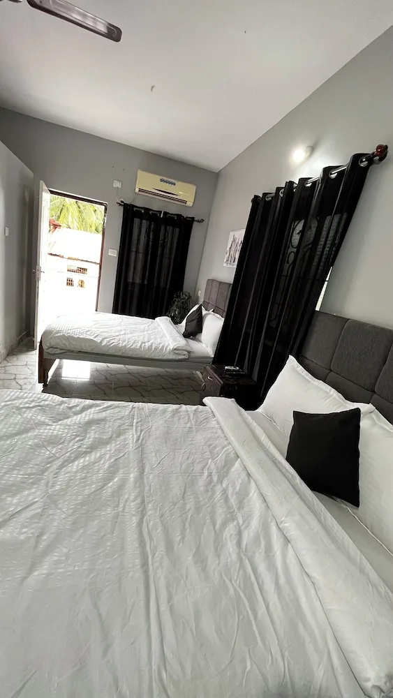 غرفة ديلوكس رباعية بسريرين منفصلين، Casa Almeida Guest House 3/4