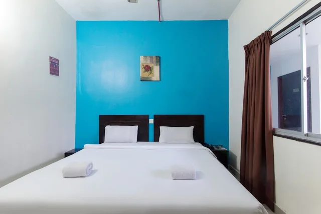 غرفة ديلوكس بسرير كينج، Hotel Grand Mutiara 1/10