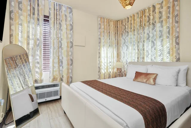 جناح بسرير كوين بغرفة نوم واحدة مع أريكة، Tradewinds Apartment Hotel 5/10