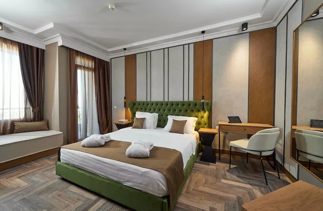 جناح جونيور بسريرين منفصلين، ROYAL HOTEL 2/4