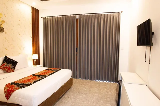 غرفة ديلوكس، Ratu Guest House 1/4