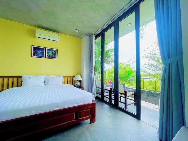 غرفة ديلوكس بسرير كينج بإطلالة على الحديقة، Gia Huy Riverside Hotel Hoi An 2/10