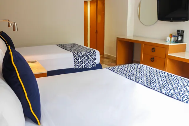 غرفة سوبيريور ثلاثية بسريرين مزدوجين، Plaza Pelicanos Club Beach Resort 7/9