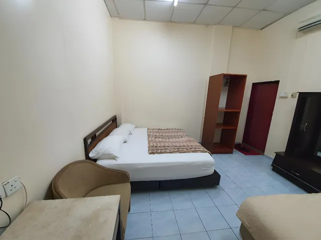 غرفة سوبيريور ثلاثية بسرير مزدوج وسرير فردي، SPOT ON 90137 Casavilla Hotel Pudu 1/1
