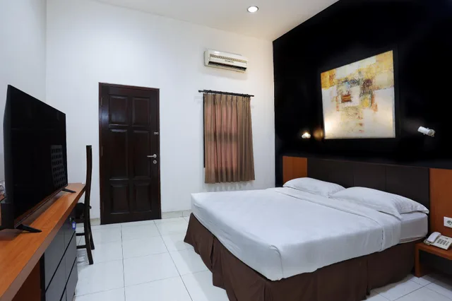 غرفة ديلوكس، Jambuluwuk Heritage Menteng Suites 1/2