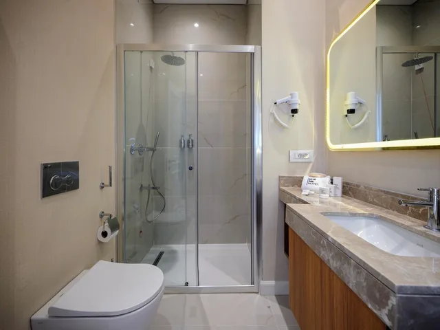 غرفة ديلوكس بسرير كوين مع أريكة، NEW INN HOTEL Old Town 6/8