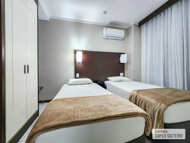 غرفة مفردة بسريرين منفصلين، Triangulo Apart Hotel 5/10