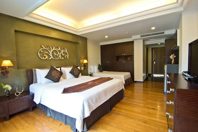 غرفة ديلوكس ثلاثية بسرير مزدوج، Lk Mantra Pura Resort 1/1