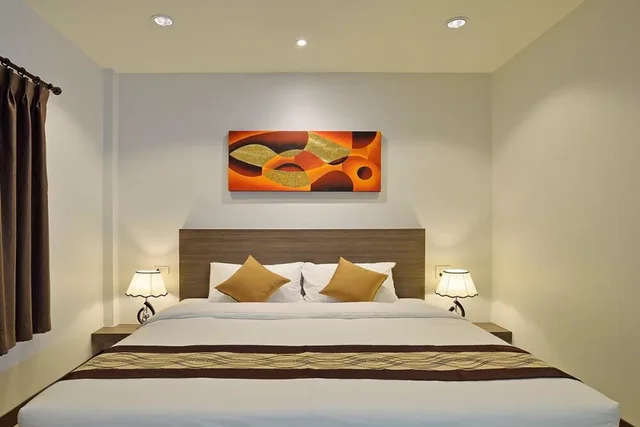 غرفة قياسية بسرير كوين، The Rich Resort 1/4